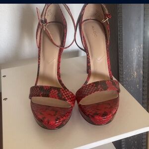 Heels, snake print, never worn! Size 8 but 7.5 works too